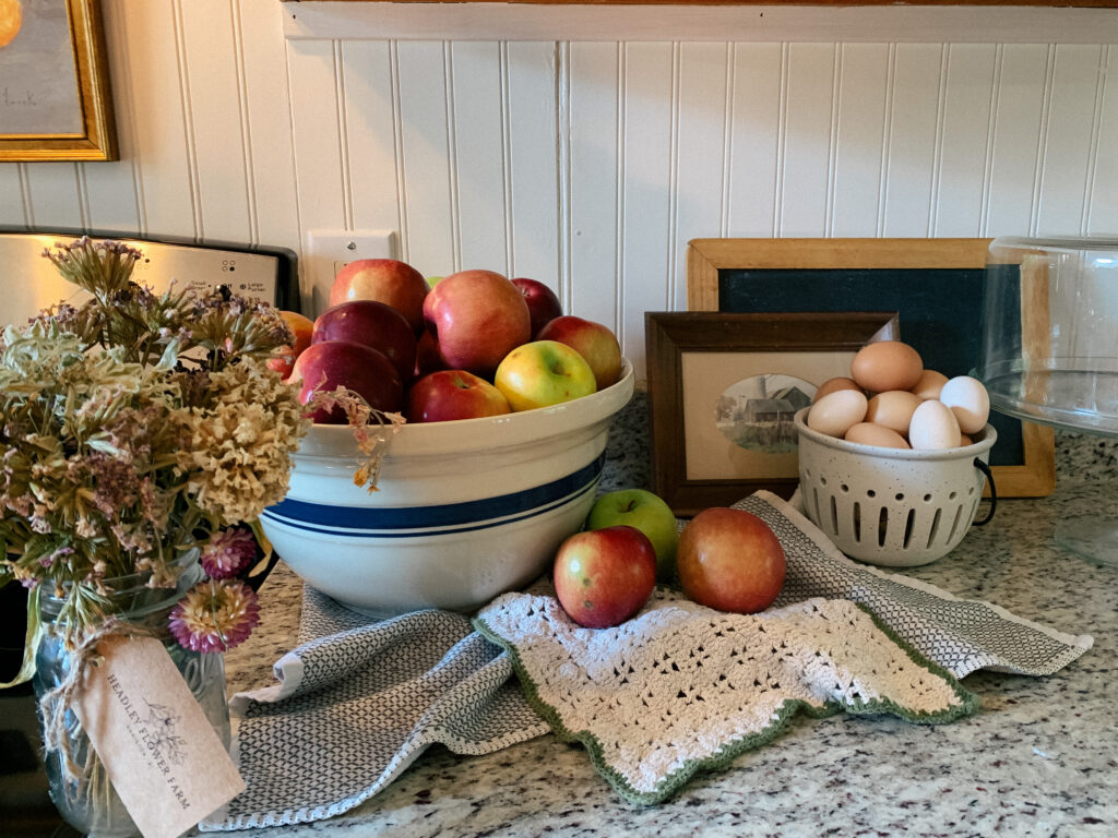 Apples and Flowers on counter